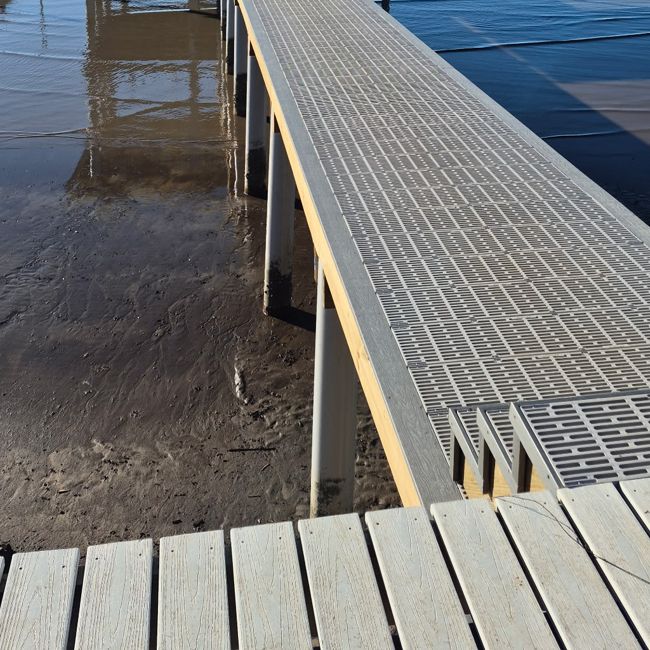 The detail: Decking that drains, stays cooler and lets light through.