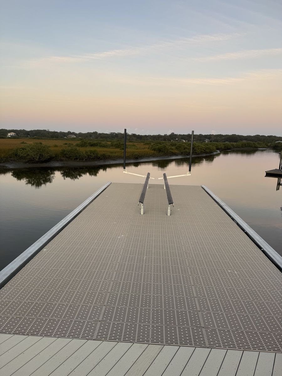 Sunstream lift built into a dock platform, with the bunks at dock level